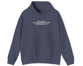 May include: A navy blue hooded sweatshirt with a front pocket and drawstring hood. The text "Hear, O Israel: The LORD our GOD is one LORD. DEUTERONOMY 6:4" is printed in white across the chest. The sweatshirt is made of a soft material.