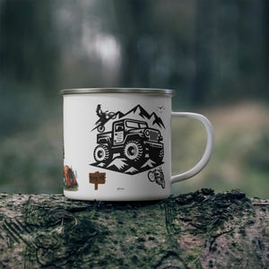 May include: White enamel camping mug featuring black illustrations of a jeep, motorcycle, and mountains. The mug also has a sign that says "Day Off". The mug is sitting on a log.