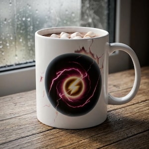 May include: White ceramic mug filled with hot chocolate and marshmallows. The mug has a black and red lightning bolt design. The mug is on a wooden surface near a window with raindrops.