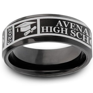 May include: Black tungsten carbide ring with a silver inscription that reads "AVENAL HIGH SCHOOL" and "2025" with a graduation cap and diploma graphic. The ring is engraved with "AHS" on the other side.