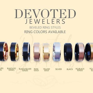 May include: A row of nine men's wedding bands in various metal colors, including black, silver, rose gold, and yellow gold. The bands have beveled edges and are labeled with their color combinations, such as "Black/RG Edges" and "YG/Black Edges".