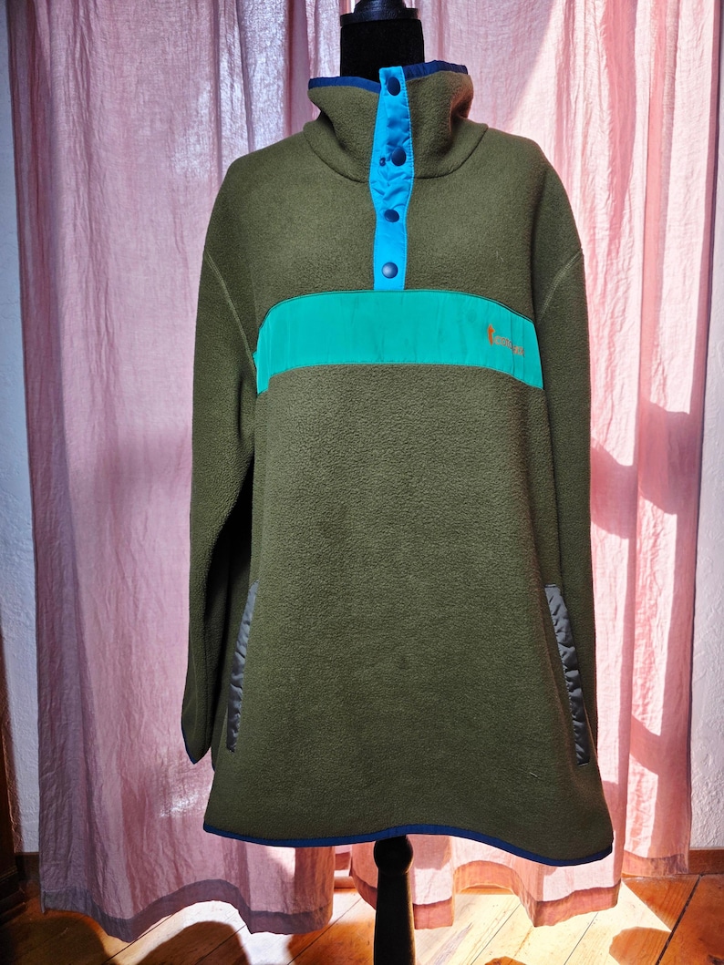 Sudadera polar Cotopaxi Teca para hombre, talla XXL, color verde oliva y azul, con cierre a presión. imagen 1