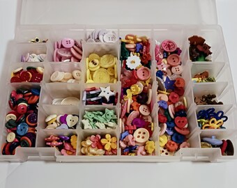 Plastic Divided Container of Buttons - Different shapes, sizes and colors