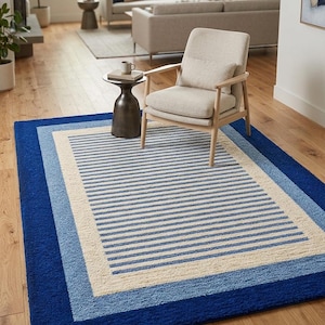 Elegant blårandig ullmatta – Handtuftad designmatta