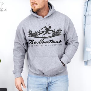 The Mountains Are Calling And I Must Go Hoodie: Outdoor Adventure Sweatshirt