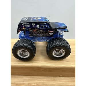 Monster Jam Son-Uva Digger 1:64 Camioneta monstruo de metal fundido imagen 1
