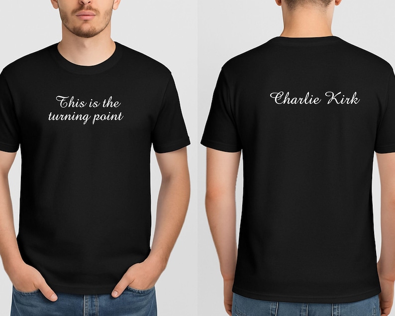 May include: Black crew neck t-shirt with the text "This is the turning point" on the front and "Charlie Kirk" on the back in white script. The shirt is a basic tee.