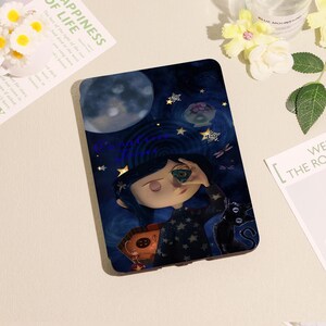May include: A dark blue phone case featuring a cartoon illustration of a girl with blue hair, holding a green object to her eye. The case has a starry night sky design with a moon, stars, and a black cat.