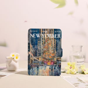 May include: A New Yorker magazine cover depicting a winter scene with a large Christmas tree in front of a building. The cover has the text "THE NEW YORKER" and the date "Dec 18, 1965". The cover is a vertical rectangle.
