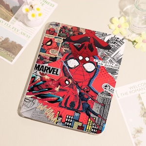 May include: A clear tablet case featuring a vibrant Spider-Man comic book design. The case showcases Spider-Man in various action poses, with the Marvel logo prominently displayed. The background includes comic panels and cityscapes.