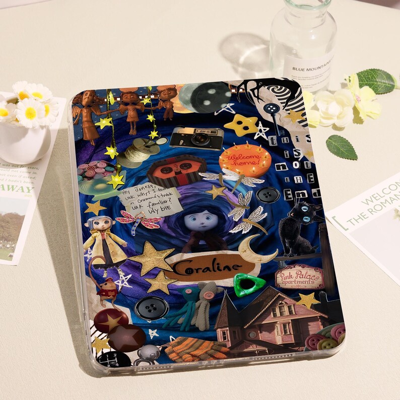 May include: A clear case for a tablet featuring a collage of elements from the movie "Coraline." The design includes characters, stars, buttons, and the text "Coraline" and "Welcome home!" in a whimsical arrangement. The case is surrounded by a clear border.