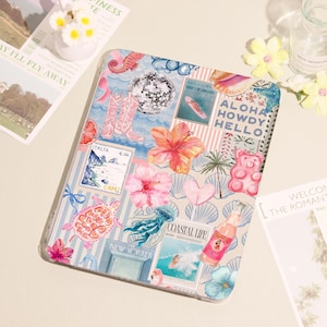 May include: A rectangular case with a collage of watercolor illustrations. The design includes pink cowboy boots, a disco ball, hibiscus flowers, a gummy bear, and the text "ALOHA HOWDY HELLO". The case has a blue and white striped background.