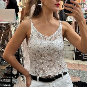 May include: A set of three ceramic mugs with a speckled, matte finish. The mugs are in shades of cream, light brown, and dark brown. Each mug has a simple, minimalist design, perfect for coffee or tea.