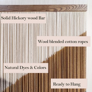 May include: A wall hanging made of natural cotton and wool ropes, dyed in natural colours. The ropes are hung from a solid hickory wood bar. The wall hanging is ready to hang.