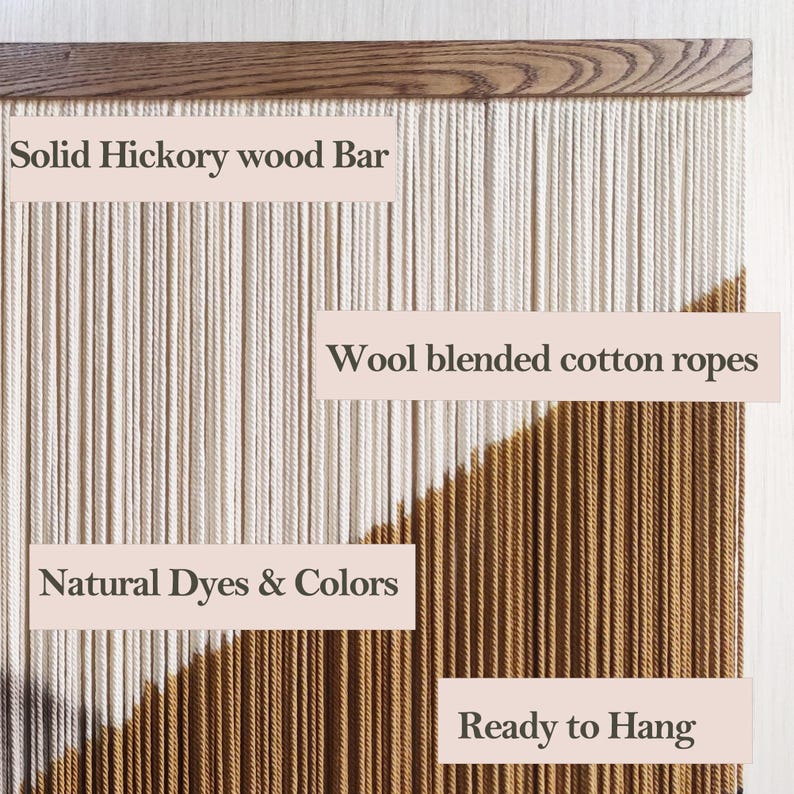May include: A wall hanging made of natural cotton and wool ropes, dyed in natural colours. The ropes are hung from a solid hickory wood bar. The wall hanging is ready to hang.