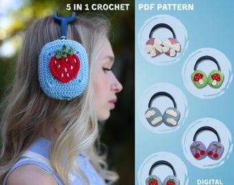 May include: A light blue crochet headphone cover with a red strawberry design is worn on a person's head. The image also shows examples of other crochet headphone covers with floral, mushroom, cloud, and cherry designs. Text reads "HEADPHONE COVERS 5 IN 1 CROCHET PDF PATTERN".