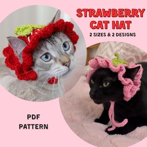 May include: Two cats wearing crocheted strawberry hats. The hats are red with green leaves and pink with green leaves. The text on the image says "STRAWBERRY CAT HAT, 2 SIZES & 2 DESIGNS" and "PDF PATTERN".