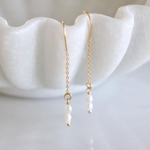 Pendientes enhebradores de perlas