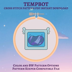 Può includere: Uno schema a punto croce raffigurante un robot quadrato azzurro con piccole ali e uno schermo viola scuro lucido come volto, inserito in un telaio da ricamo in legno. Il testo recita TEMPBOT CROSS STITCH PATTERN PDF INSTANT DOWNLOAD.