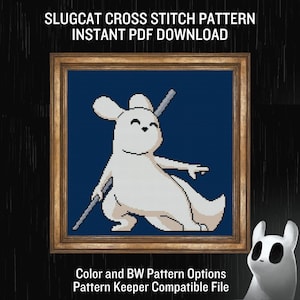 May include: A cross-stitch pattern featuring a white Slugcat character with a gray spear, set against a blue background within a gold-colored frame. The text "SLUGCAT CROSS STITCH PATTERN INSTANT PDF DOWNLOAD" is at the top. Additional text includes "Color and BW Pattern Options Pattern Keeper Compatible File."