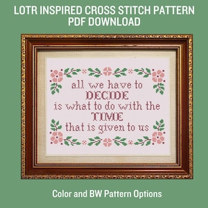 May include: A framed cross-stitch pattern with the text "all we have to DECIDE is what to do with the TIME that is given to us." The design includes floral and leaf accents in pink and green. The frame is brown with a gold inner border. The text "LOTR INSPIRED CROSS STITCH PATTERN PDF DOWNLOAD" is at the top.