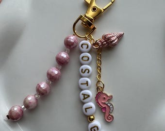 Llavero/colgante para bolso con temática playera