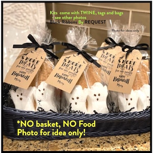 DIY Halloween S'more Treat kit. Shown in clear bags with ghost marshmallows, chocolate & graham crackers tied with a Black Ribbon. Kits include Tag, Bag & Twine. Black Ribbons by request. No food in DIY kit. Smore Treats for my peeps.Happy Halloween.