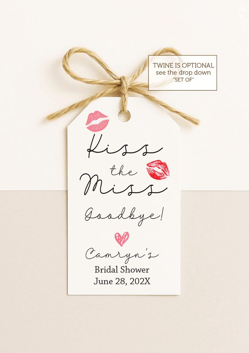 May include: A white tag with the text "Kiss the Miss Goodbye!" and "Camryn's Bridal Shower June 28, 202X". The tag features pink lip prints and a heart, with a twine bow at the top.