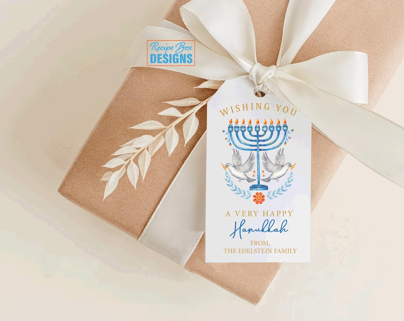 May include: A gift wrapped in brown paper with a white ribbon and a Hanukkah gift tag. The tag features a blue menorah, doves, and the text "Wishing You A Very Happy Hanukkah".