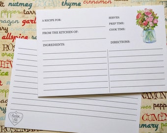 May include: White recipe cards with lined spaces for ingredients and directions. The cards have a floral illustration of pink roses in a glass jar. Text on the cards includes "A Recipe For", "From the Kitchen of", and "Ingredients".