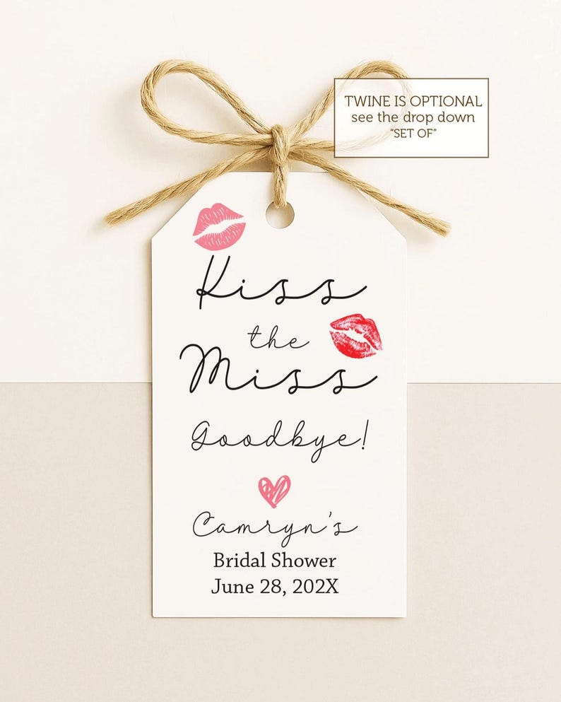 May include: A white tag with the text "Kiss the Miss Goodbye!" and "Camryn's Bridal Shower June 28, 202X". The tag features pink lip prints and a heart, tied with twine.