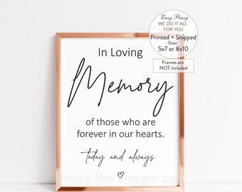 May include: A framed print with a white background and black text that reads "In Loving Memory of those who are forever in our hearts. Today and always." The frame is a rose gold color. The print is available in 5x7 or 8x10 sizes.
