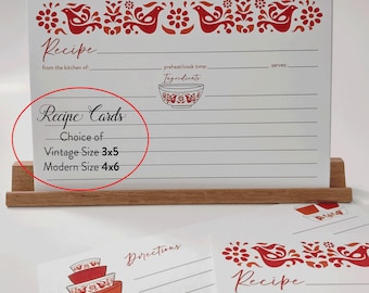 May include: Set of recipe cards with a red and white folk art design featuring birds and flowers. The cards have lines for writing down recipes, ingredients, and directions. The text on the cards reads "Recipe Cards, Choice of, Vintage Size 3x5, Modern Size 4x6".