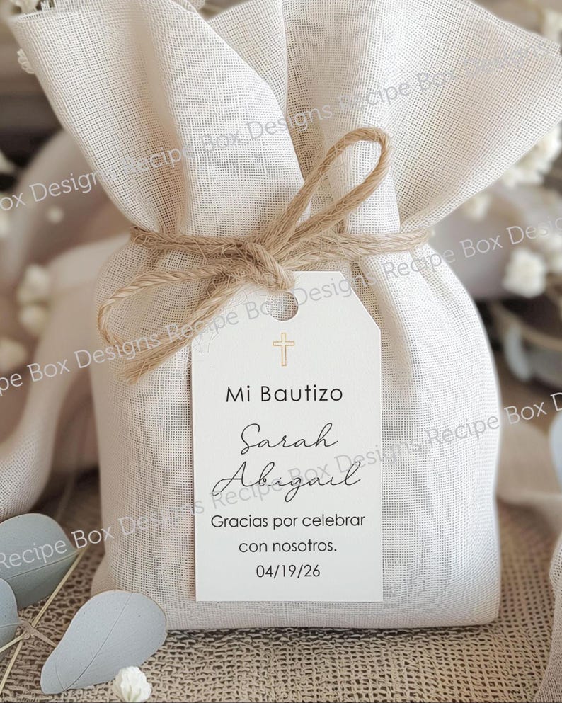 Favor tags for Mi Bautizo Printed in Spanish. They with a gold cross at the top of the tag and childs name is printed on the tag.  Listing is for tags only. Option to purchase twine string at checkout. (The tag is displayed on a burlap bag but is not included)