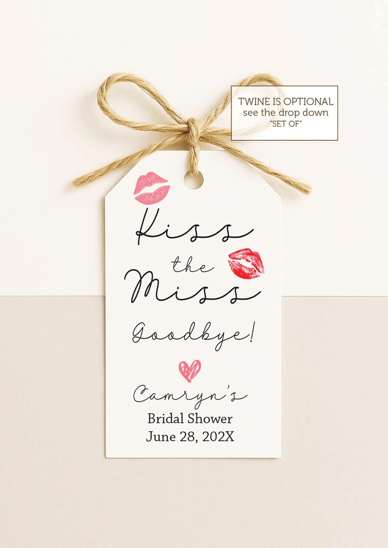 May include: A white tag with the text "Kiss the Miss Goodbye!" and "Camryn's Bridal Shower June 28, 202X". The tag features pink lip prints and a heart, with a twine bow at the top.