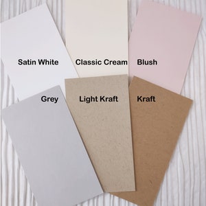 May include: Six different cardstock paper samples in various colors and textures. The colors are Satin White, Classic Cream, Blush, Grey, Light Kraft, and Kraft.