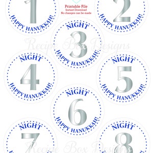 May include: Eight circular labels featuring large silver numbers from one to eight. Each label includes the blue text NIGHT and HAPPY HANUKKAH! arranged in a dotted blue circular border. The top center displays the text Recipe Box Designs.