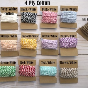 May include: A selection of 4-ply cotton twine in various colors, including white, black/white, pink/white, and light blue/white. Also includes jute twine. Each spool is displayed on a brown card. Text on the image reads "4 Ply Cotton".