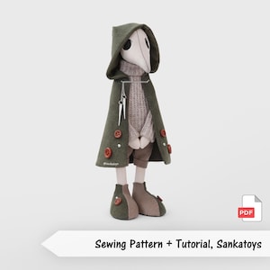 Puede incluir: Una muñeca de tela con máscara de médico de la peste, con una capa de pana verde oliva con capucha, botones marrones y una cadena plateada, un suéter de punto beige, pantalones marrones y zapatos de dos tonos. Texto: Sewing Pattern + Tutorial, Sankatoys.