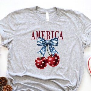 Camiseta de cereza americana, camiseta del 4 de julio, camiseta de cereza americana, camiseta con lazo coqueto, camiseta patriótica para mujer, camiseta americana