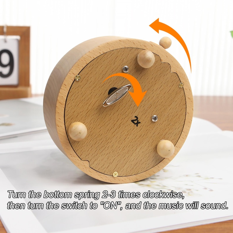 May include: A wooden music box with a spring mechanism on the bottom. Turn the spring clockwise 2-3 times, then turn the switch to "ON" to play music.