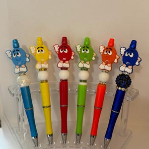 M&M com miçangas