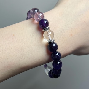 Top-down view of the bracelet on wrist under diffused lighting, showing color tones.