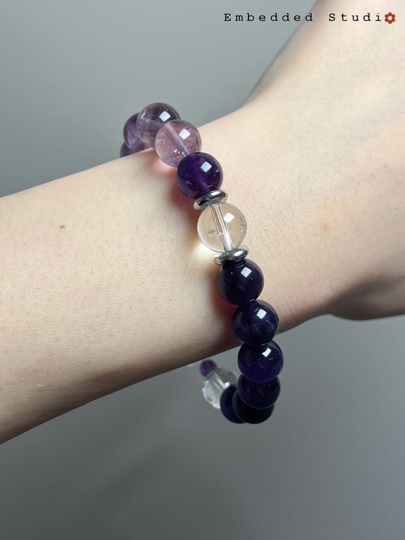 Top-down view of the bracelet on wrist under diffused lighting, showing color tones.