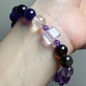 Angled wrist view of the bracelet, showing the curve and comfort of the fit.