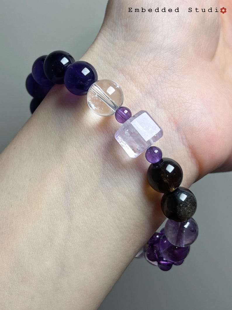 Angled wrist view of the bracelet, showing the curve and comfort of the fit.