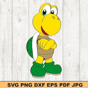 May include: A yellow cartoon turtle with green shell and arms crossed, wearing a white shell on its back.