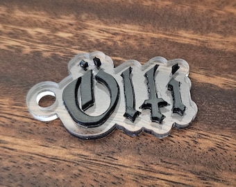 3-D Doom Metal keychain with your name, made of acrylic glass