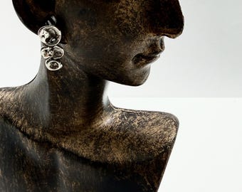SINGLE earring. Single post with 3 graduated organic looking manipulated granules.