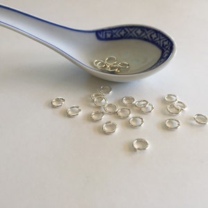 Snapeez  6mm Sterling Silver Snapping Jump Ring sold in packs of 25, 18ga, silver plated (se-ssez6-25